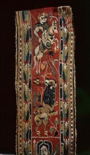 Detail of a Coptic textile, showing a mounted knight, possibly St