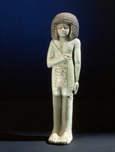A faience overseer shabti from the burial of Takeloth, found in the tomb of his father Prince Shoshenq, priest of Ptah at Memphis