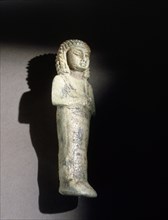 A faience overseer shabti from the burial of Takeloth, found in the tomb of his father Prince Shoshenq, priest of Ptah at Memphis