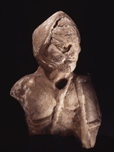 Terracotta image of a gladiator, wearing a helmet and carrying a rectangular shield