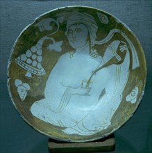 Terracotta bowl depicting a man serving wine