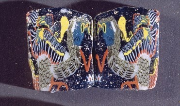 Two identical glass fragments decorated with a lapwing