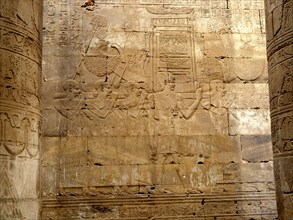 A relief in the Hypostyle Hall at Edfu depicting the procession of the sacred barque