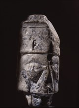 Relief carving of the head of the goddess Hathor on a limestone capital