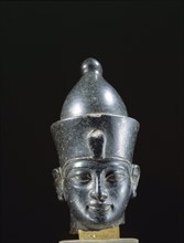 Gabbro portrait head of an unidentified pharaoh wearing uraeus and double crown