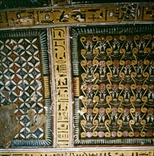 Detail of the geometrical patterns and Hathor heads covering the ceiling of the tomb of Inherkha