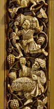 Carved ivory plaque from a piece of furniture