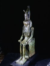 Figure of the god Horus in his falcon head aspect wearing the double crown