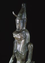 Figure of the god Horus in his falcon head aspect, wearing the double crown