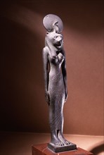 Bronze figure of the lion headed goddess Sekhmet with sun disc and uraeus