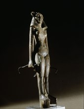 Figurine of a nude female dancer wearing a leonine mask, holding a bronze serpent in each hand
