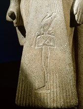 Statuette identified as either a priest of Hathor or of Mut, wife of the God Amun, found in the court of the temple of Amun at Karnak