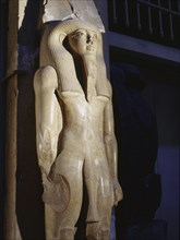 Statue of a 17th or 18th dynasty king wearing an unusual early form of dress