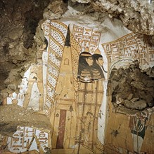 A detail of a painting in a private tomb which shows the owners and his wifes mummy outside the tomb entrance prior to burial