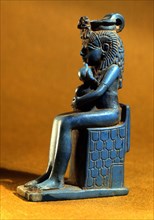 A fine example of sculpture in Egyptian blue, a material closely allied to glass