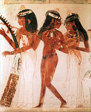 A detail of a painting from the tomb of Nakht depicting three female musicians