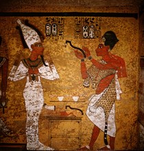 Wall painting from the tomb of Tutankhamun showing King Aye performing the mouth opening ritual on the mummy of Tutankhamun