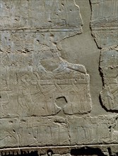 Fragmentary relief showing porters carrying a solar barque