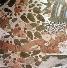 A fragment of a wall painting from the tomb of Userhet, first prophet of the royal ka of Tuthmosis I, showing the gift of the tree goddess: loaves, figs, a pomegranate, grapes and a honeycomb