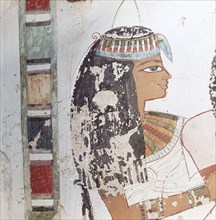 A detail of a painting in a private tomb depicting a woman wearing a wig and a headband
