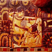 A detail of a hunting scene on the side of a chest from the tomb of Tutankhamun