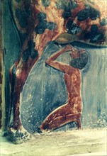A detail of a painted sandstone statue from the chapel of Tuthmosis III