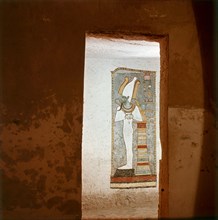 An unfinished wall painting of Osiris in the tomb of Horemheb