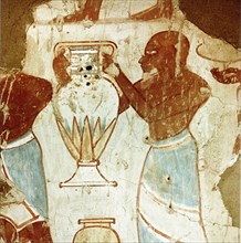 Wall painting from the tomb of the scribe Horemheb, depicting a servant or foreigner bearing an offering of a jar, probably containing fragrant oil