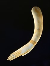 Ivory clapper in the form of a hand
