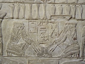 A detail of a relief in the tomb of Mereruka which depicts metalworkers and dwarfs employed in the manufacture of jewellery