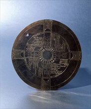 This gold disc is engraved with the Vision of the Four Castles, experienced during one of John Dees (1527 1608) experiments at Krakow in 1584