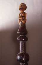 Ivory staff or sceptre finial, a prestige carving for royal or chiefly use, depicting a matrilineal ancestor