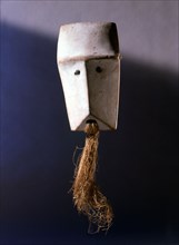 A mask which are not worn but manipulated and used as a mnemonic device linked with proverbs recited during the initiation rites of the senior grades of the Lega Bwami society