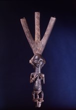 Bowstand in the form of a female figure