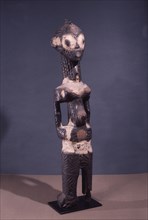 A standing figure with scarification design which was used in the Chibola cult