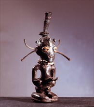 A small Songye power figure obtained from a doctor/diviner and used by its owner to heal, to promote fertility or to attack enemies using attached medicines