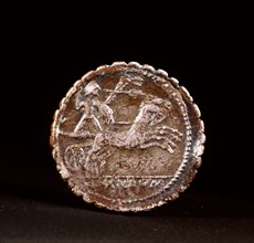 Roman denarius struck at Narbonne, depicting the victory of the Roman armies over the Gauls under the command of Bituit