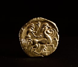 Coin showing a horse and rider
