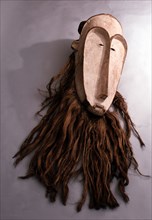 Masks with elongated white faces of this type were used by men of the Fang judiciary association known as Ngil