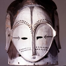 Four faced helmet masks such as this were used by the Fang Ngongtang society in anti witchcraft rituals