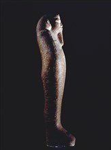 Shabti figure of King Taharqa, holding a hoe and a cord that passes over his shoulder