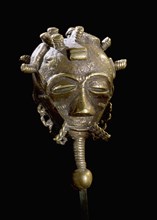 Ornament in the form of a human head