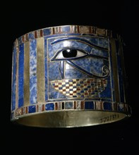 One of a pair of bracelets found on Shoshenq IIs body with representations of the Wedjat eye upon a basket