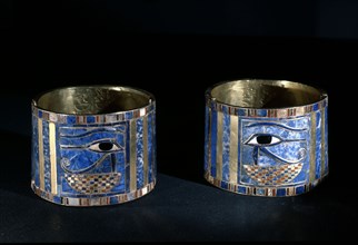 Pair of bracelets found on Shoshenq IIs body with representations of the Wedjat eye upon a basket