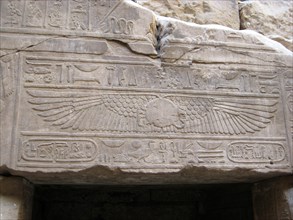 Relief of the winged sun on a door lintel of the inner sanctum