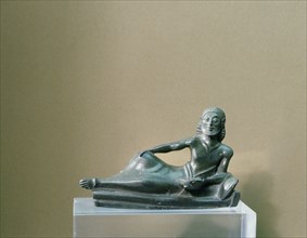 Figure of a reclining banqueteer