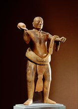 Standing male figure in an athletic posture