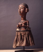 A figure probably from an altar which promotes the fertility ofwomen and crops