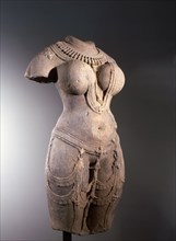 Statue of a voluptuous female deity depicted in explicit sensuality