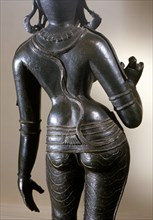 Statue of Parvati identified by the tall conical crown (katakamundra), reincarnation of Sati and consort of Shiva
